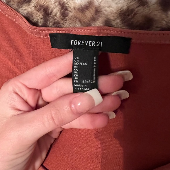 Forever 21 Rose Pink tank top with tie at the bottom; Only worn once. - Picture 3 of 3